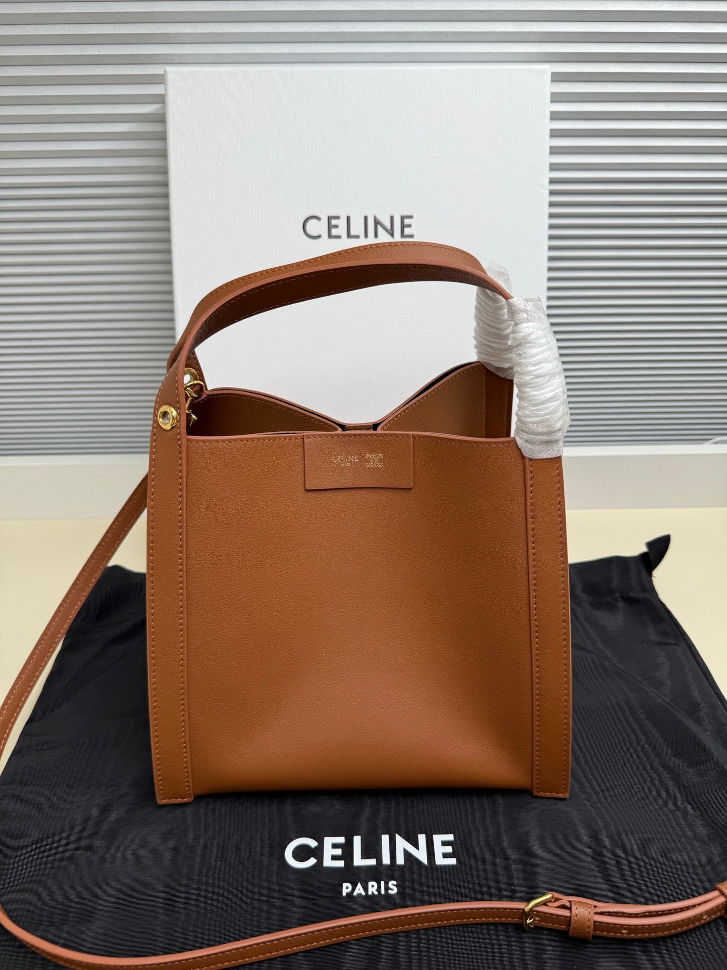 Celine tan leather mini handbag with top handle and gold-tone hardware