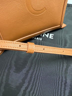 Celine tan leather mini handbag close-up of strap and embossed detailing