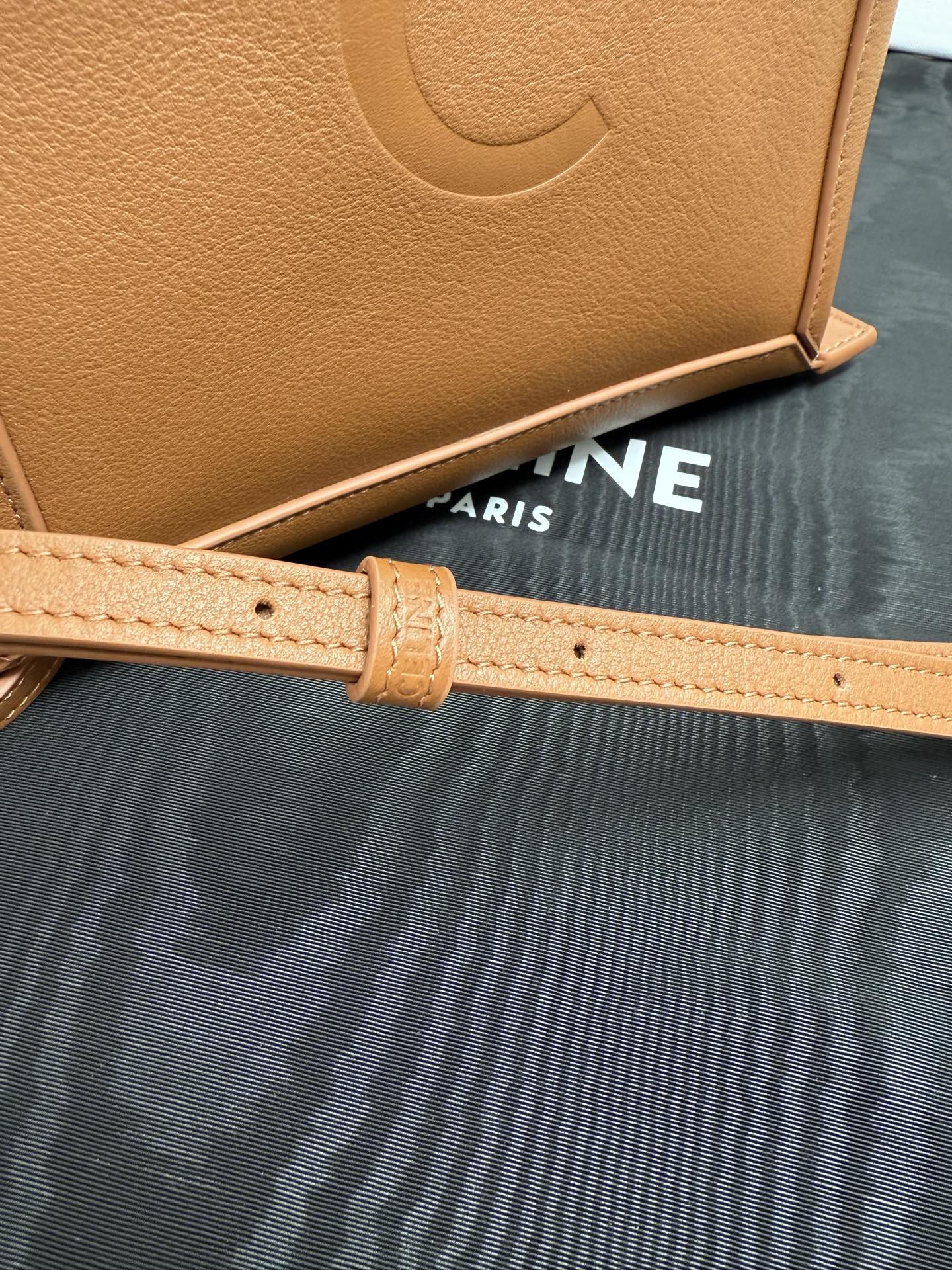 Celine tan leather mini handbag close-up of strap and embossed detailing