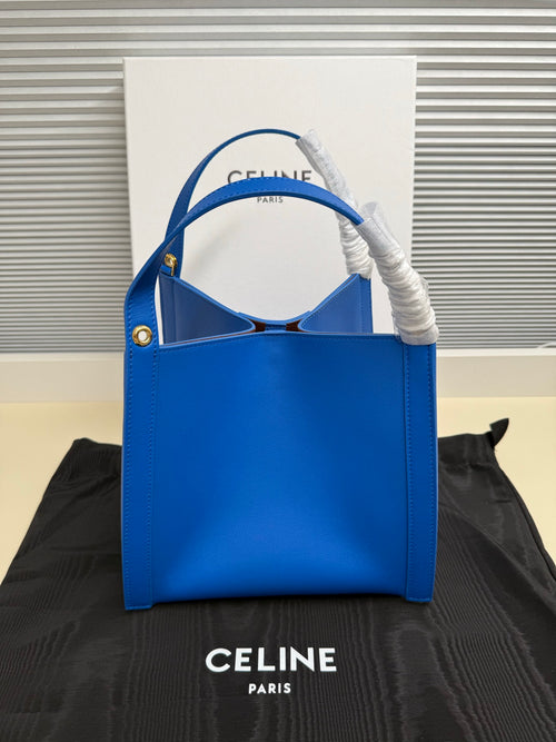 Celine blue leather tote bag with top handle and structured front panel