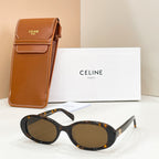 Celine sunglasses with dark frames and dark lenses, shown with brown leather case