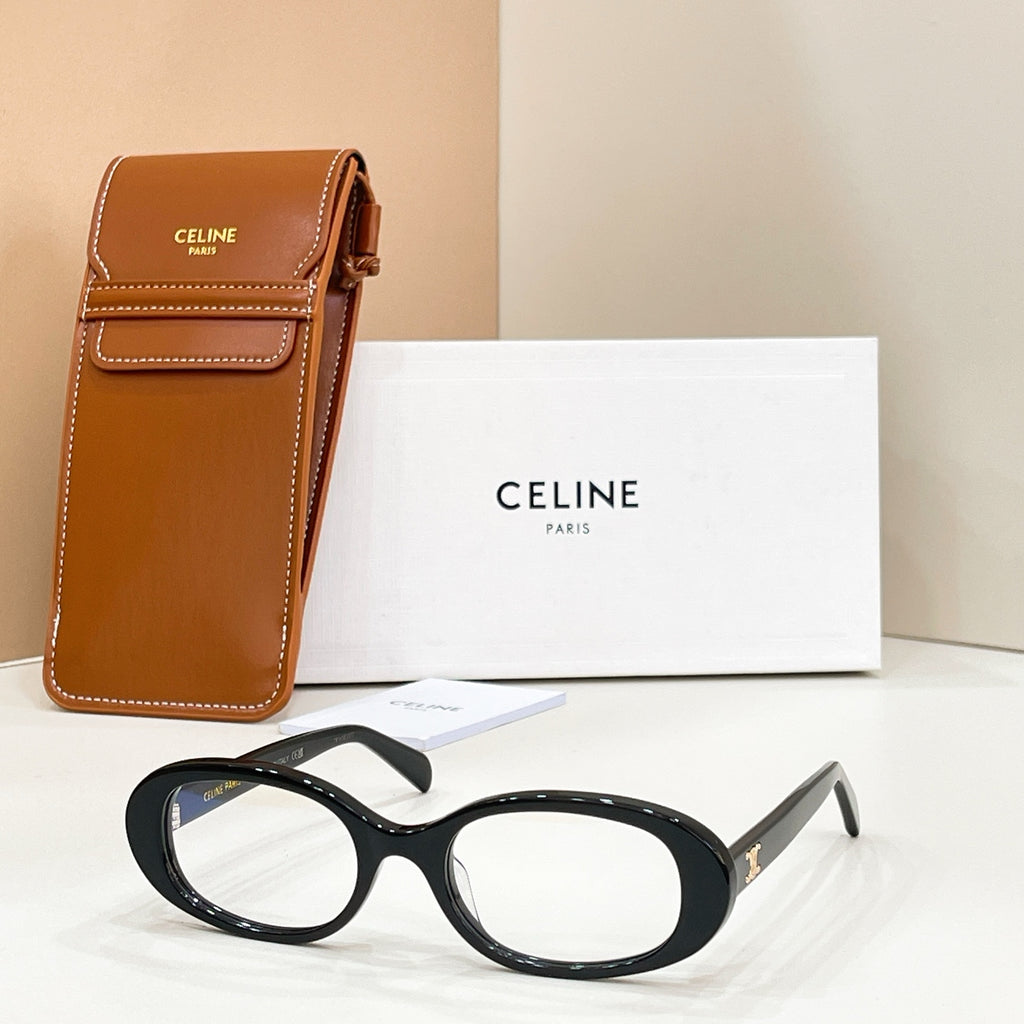 Celine eyeglasses with dark frames and clear lenses, presented with a brown leather case