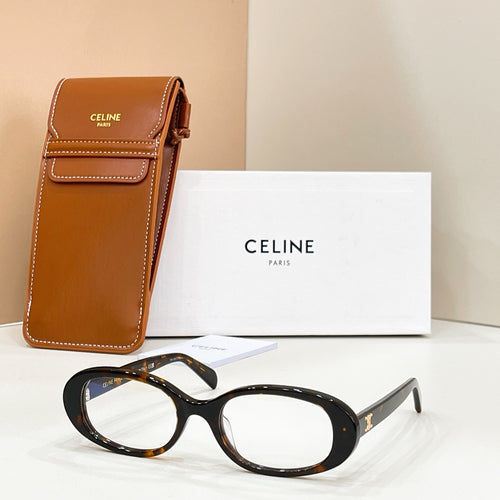 Celine eyeglasses with dark tortoiseshell frames and clear lenses, with brown leather case