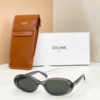 Celine sunglasses with dark gray frames and dark tinted lenses