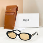 Celine sunglasses with black frames and light tan tinted lenses