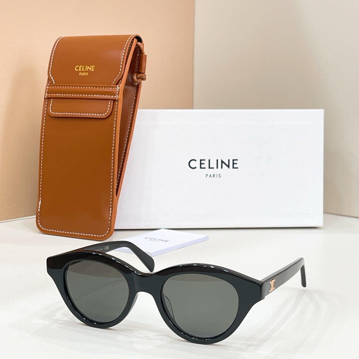 Celine glasses with black frames and gray lenses