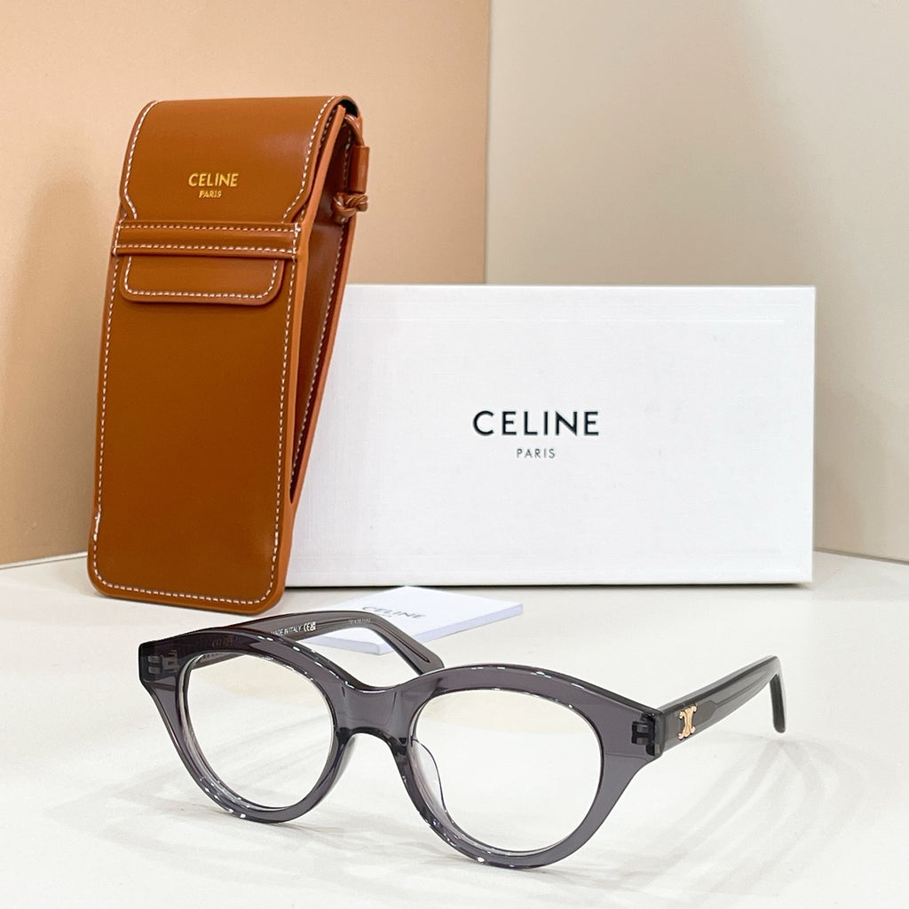 Celine glasses with dark frames and clear lenses