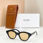 Celine glasses with black frames and amber lenses