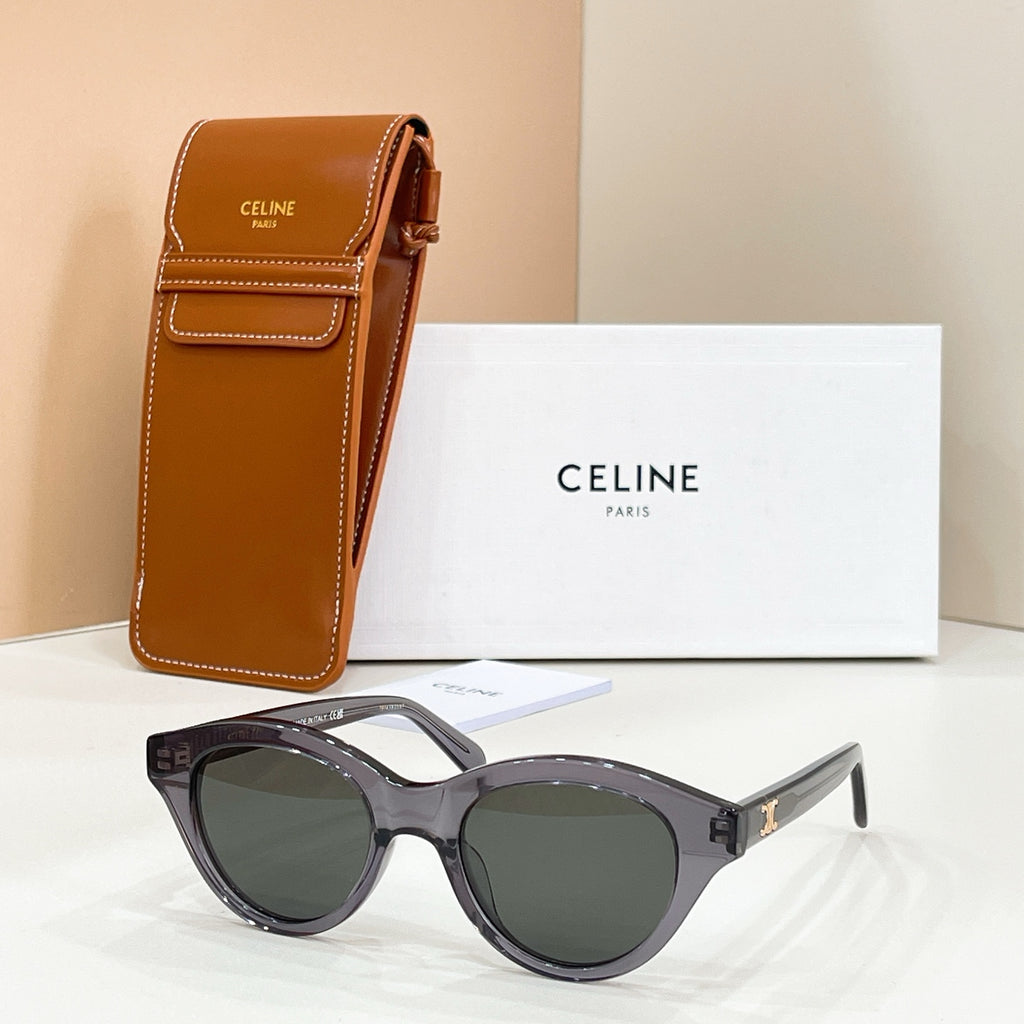 Celine glasses with black frames and dark green lenses