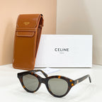 Tortoiseshell cat-eye sunglasses with dark lenses