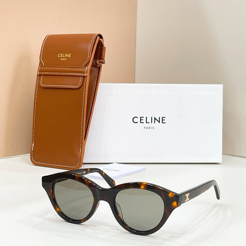 Tortoiseshell cat-eye sunglasses with dark lenses