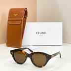Tortoiseshell cat-eye sunglasses with round dark lenses