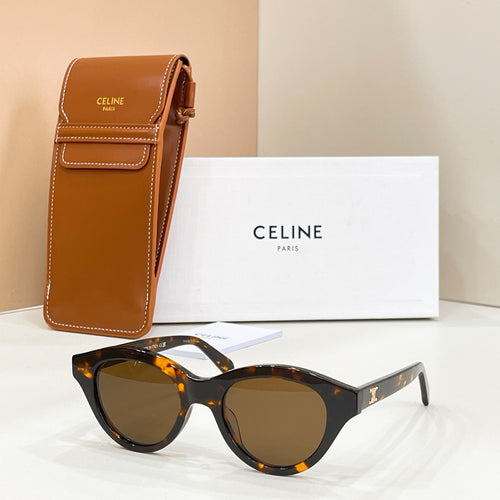 Tortoiseshell cat-eye sunglasses with round dark lenses