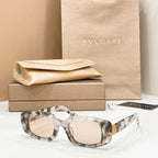 Bvlgari sunglasses with clear frame and light-tinted lenses
