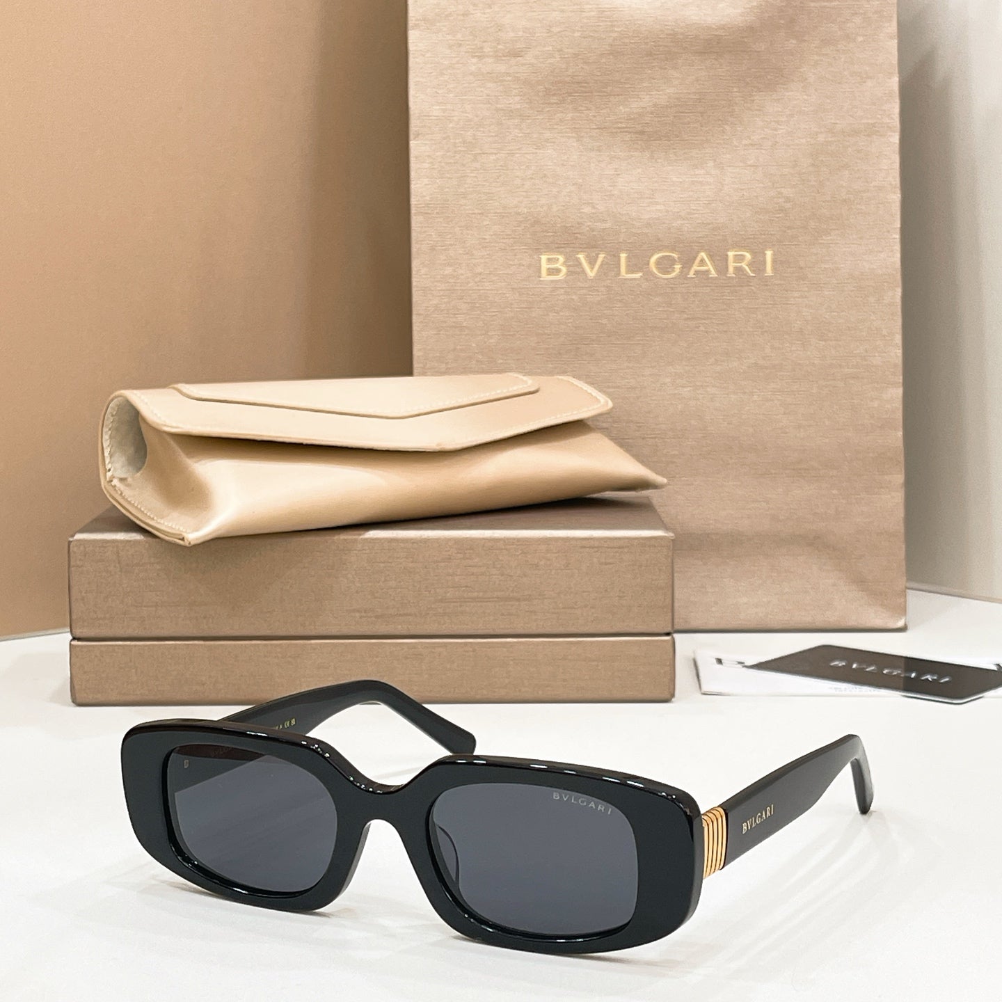 Bvlgari sunglasses with black frame and dark lenses
