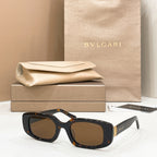 Bvlgari sunglasses with tortoiseshell frame and amber-brown lenses