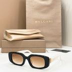 Bvlgari sunglasses with black frame and tan-brown lenses