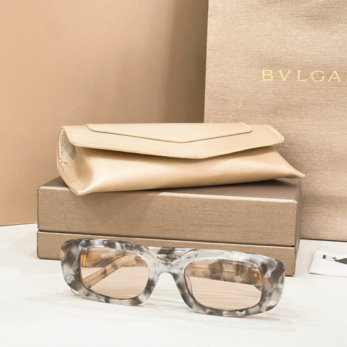Bvlgari eyeglasses, clear gray marbled acetate frames with gold-tone hinge