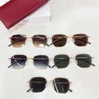 Sunglasses assortment: gold octagonal frames with dark tinted lenses