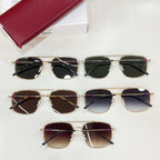 Multiple sunglasses with gold frames and assorted lens tints, with red case