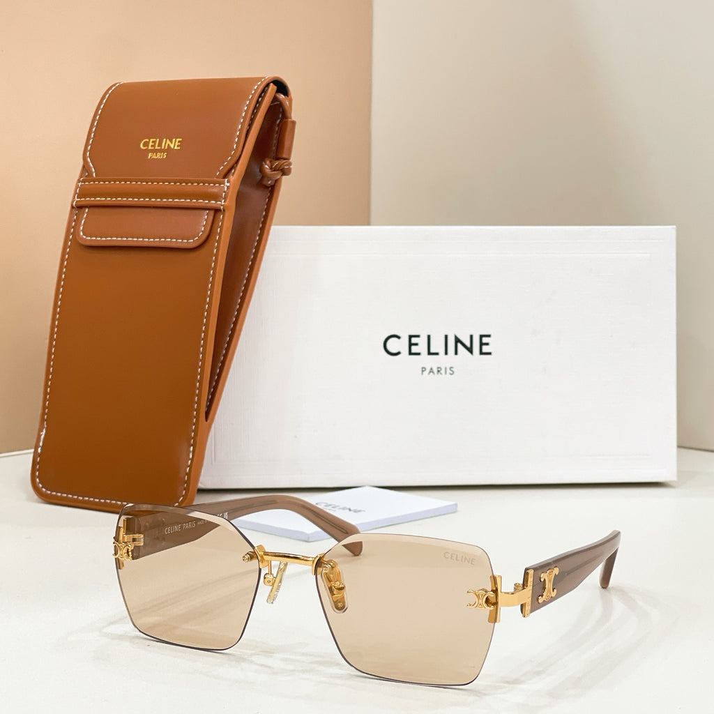 Celine sunglasses with gold frame, beige gradient lenses, and brown leather case.