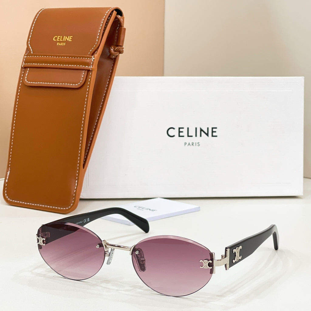 Cat-eye sunglasses with gold frame, pink lenses, and black temples with gold logo detail.
