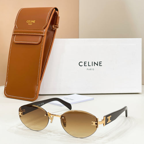Round-to-cat-eye sunglasses with gold frame, amber mirrored lenses, and black temple arms.