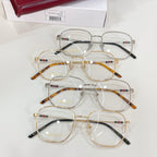 Gucci eyeglasses set with clear lenses, multiple gold and dark frames