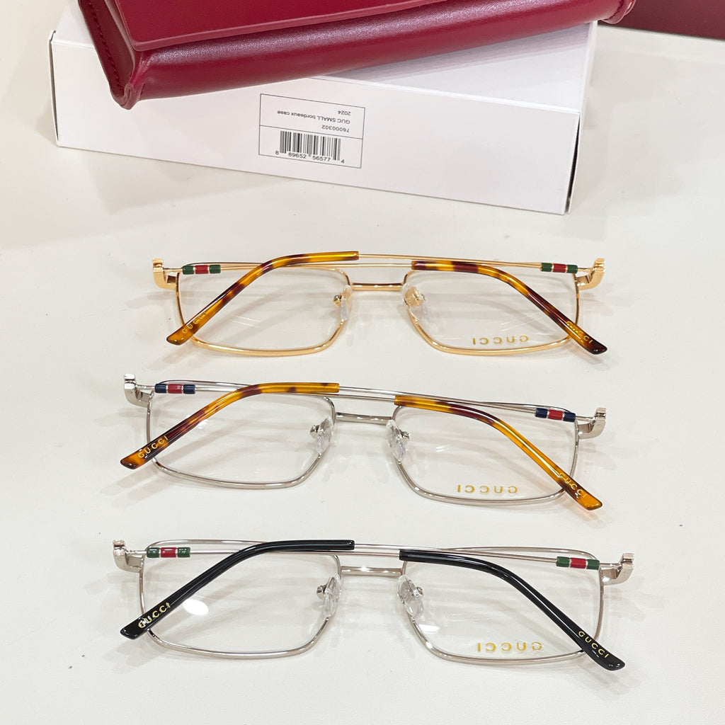 Three eyeglasses pairs with clear lenses: gold, tortoise, and black frames