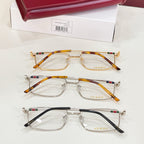 Three eyeglasses pairs with clear lenses: gold, tortoise, and black frames