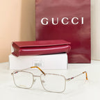 Gold metal eyeglasses with clear lenses and tortoise-pattern arms