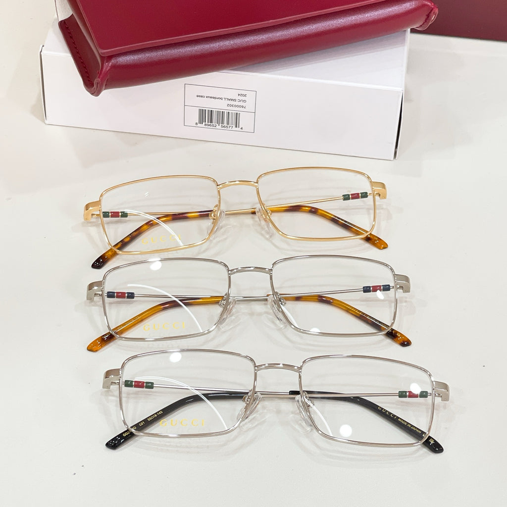 Three metal eyeglasses set: gold, tortoise, and black with clear lenses