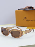 Louis Vuitton glasses, light tan frames with brown lenses and gold bridge detail