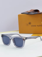 Louis Vuitton sunglasses with light gray frames and blue tinted lenses