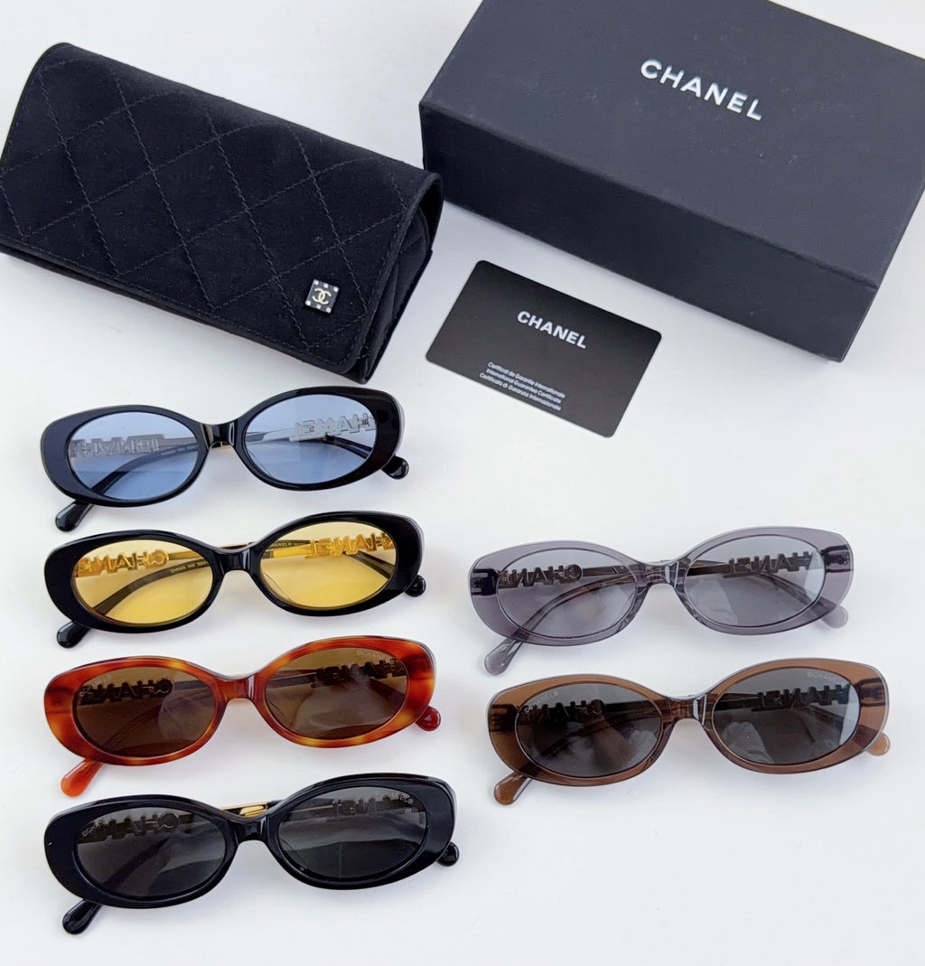 Chanel sunglasses assortment with mixed frame colors and tinted lenses, shown together.