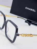 Chanel eyeglass frames, dark gray square acetate with gold logo hinge detail
