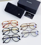 Set of Chanel optical glasses in assorted colors with round frames and gold details