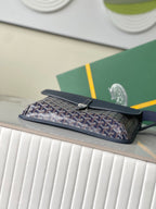 Navy monogram zip pouch clutch bag with top zipper and handle loop