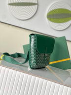 Goyard green monogram shoulder bag with adjustable strap and flap