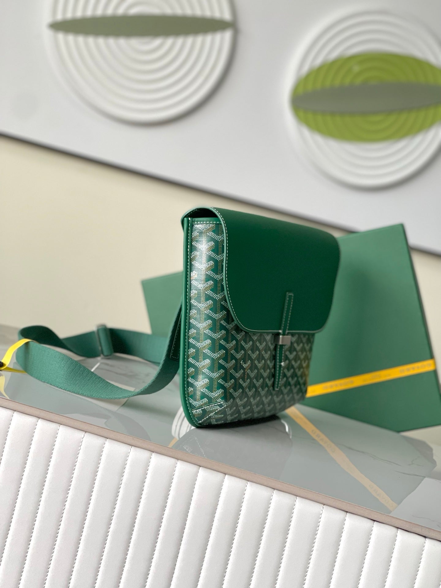 Goyard green monogram shoulder bag with adjustable strap and flap
