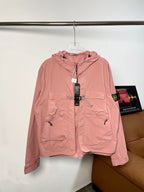 Pink Stone Island hooded zip jacket with drawstrings and front pockets