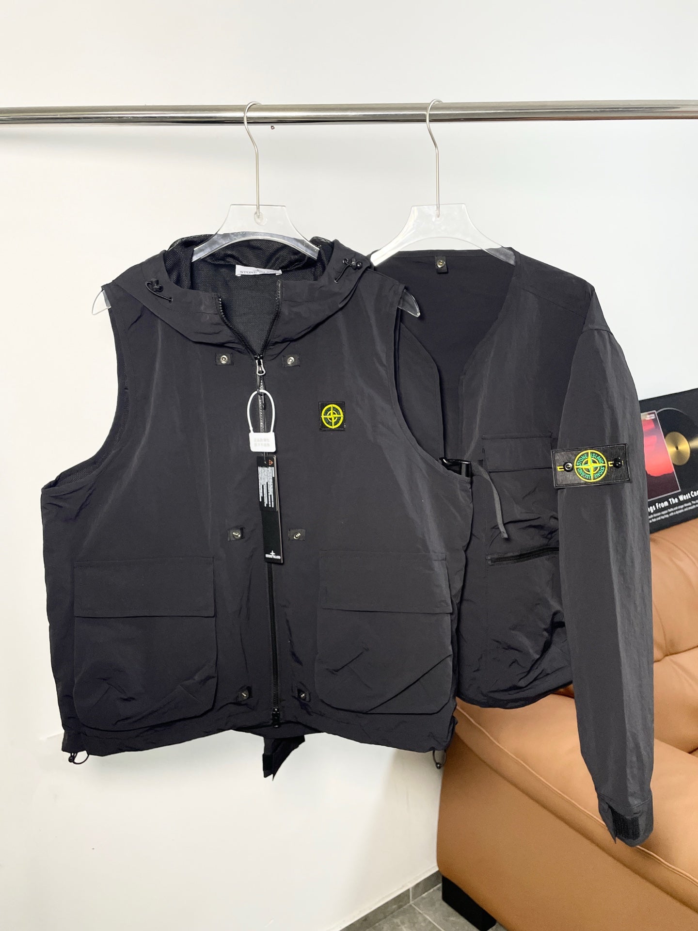 Black Stone Island hooded zip vest with front pockets and logo patch