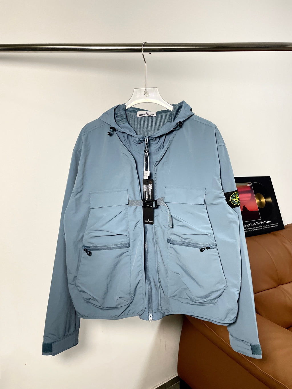 Blue Stone Island hooded zip jacket with drawstrings and front pockets