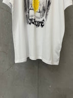 White graphic T-shirt with large front print in black and yellow