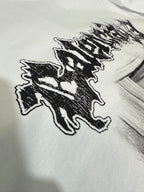 White T-shirt close-up of black graffiti-style logo print