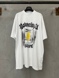 Balenciaga white graphic T-shirt with front drum-style print and yellow accent