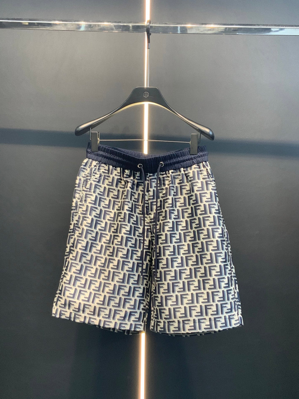 Dior pants with dark blue elastic waistband and all-over FF pattern
