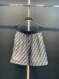 Dior pants with dark blue elastic waistband and all-over FF pattern