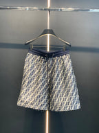 Dior pants with dark blue elastic waistband and all-over FF pattern