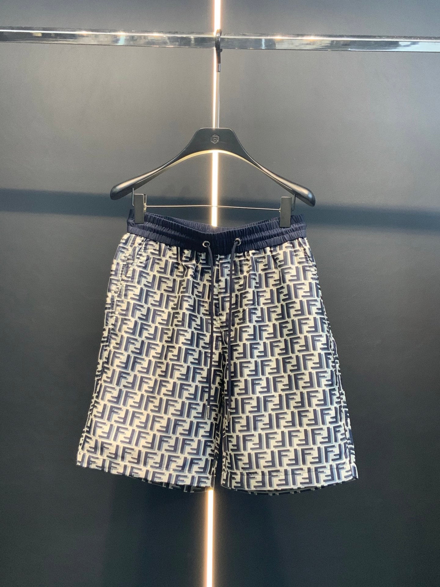Dior pants with dark blue elastic waistband and all-over FF pattern